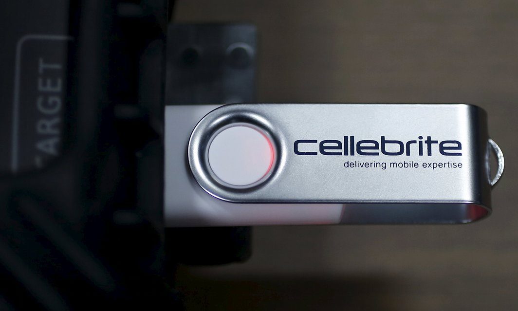 A USB device is attached to Cellebrite UFED Touch, a device for the data extraction from a mobile device such as mobile phone or smartphone. Photograph: Issei Kato/Reuters